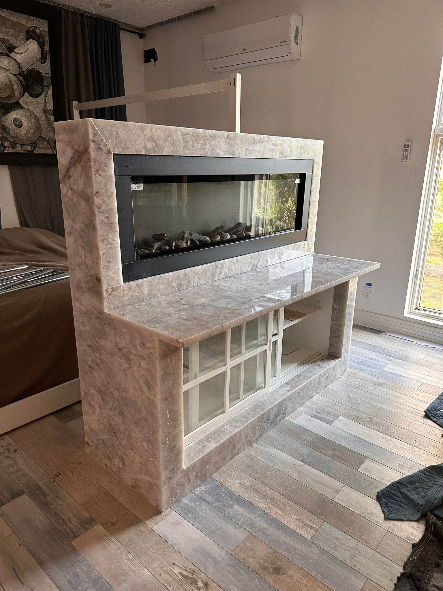 Fireplace with marble cladding